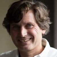 close up of a man looking into camera